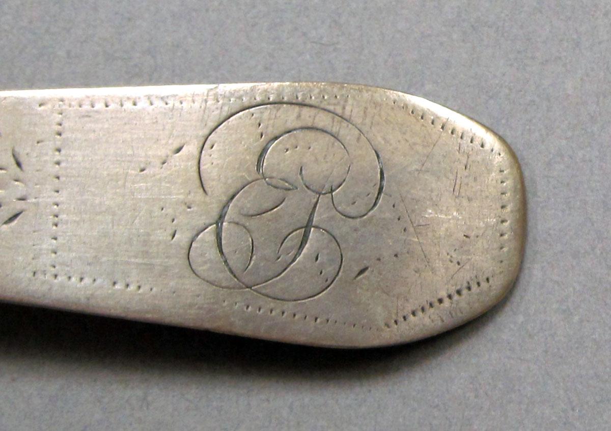 1962.0240.237 Silver spoon engraving