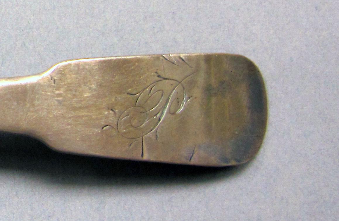 1962.0240.238 Silver spoon engraving