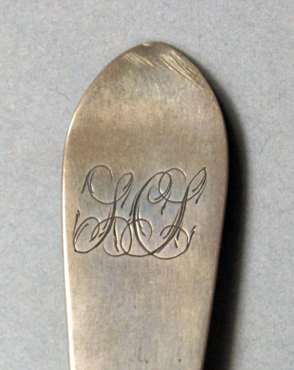 1962.0240.240 Silver spoon engraving