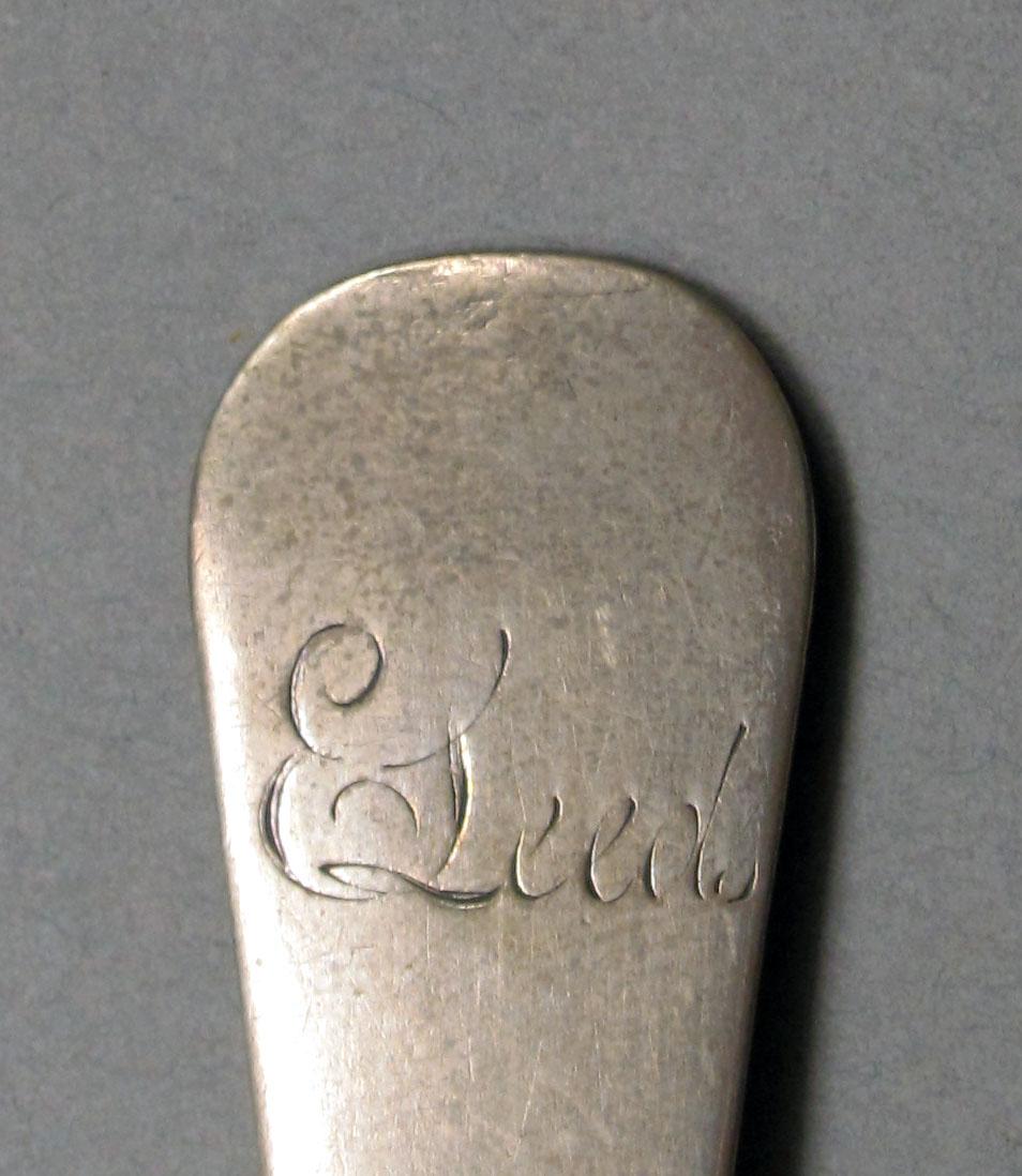 1962.0240.241 Silver spoon engraving