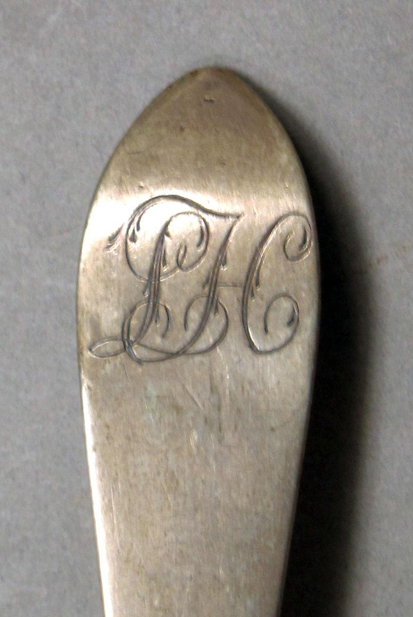 1962.0240.242 Silver spoon engraving