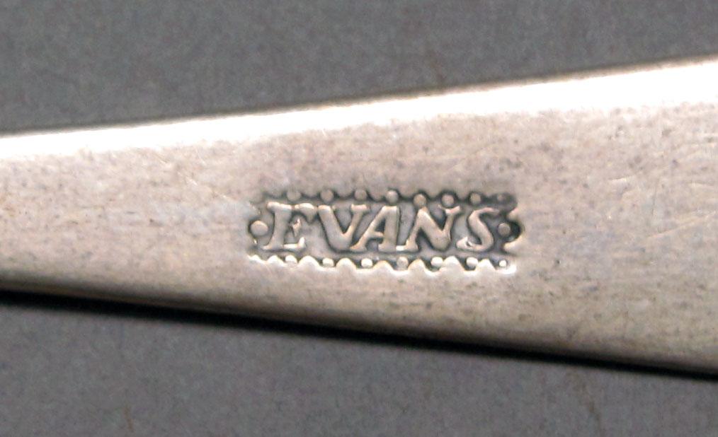 1962.0240.242 Silver spoon mark