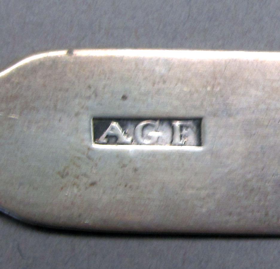 1962.0240.243 Silver spoon mark