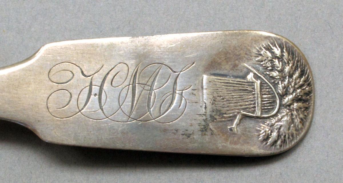 1962.0240.246 Silver spoon engraving