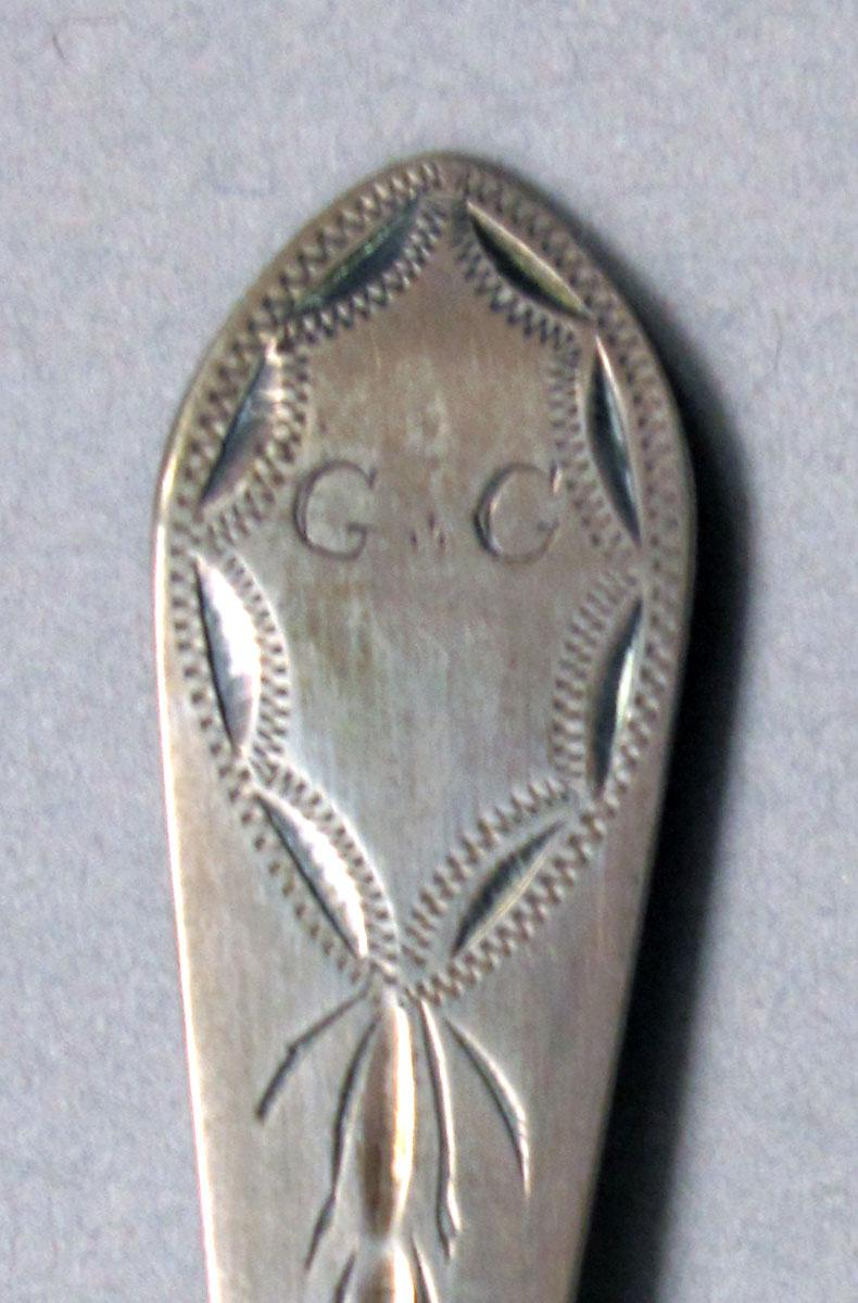 1962.0240.248 Silver spoon engraving