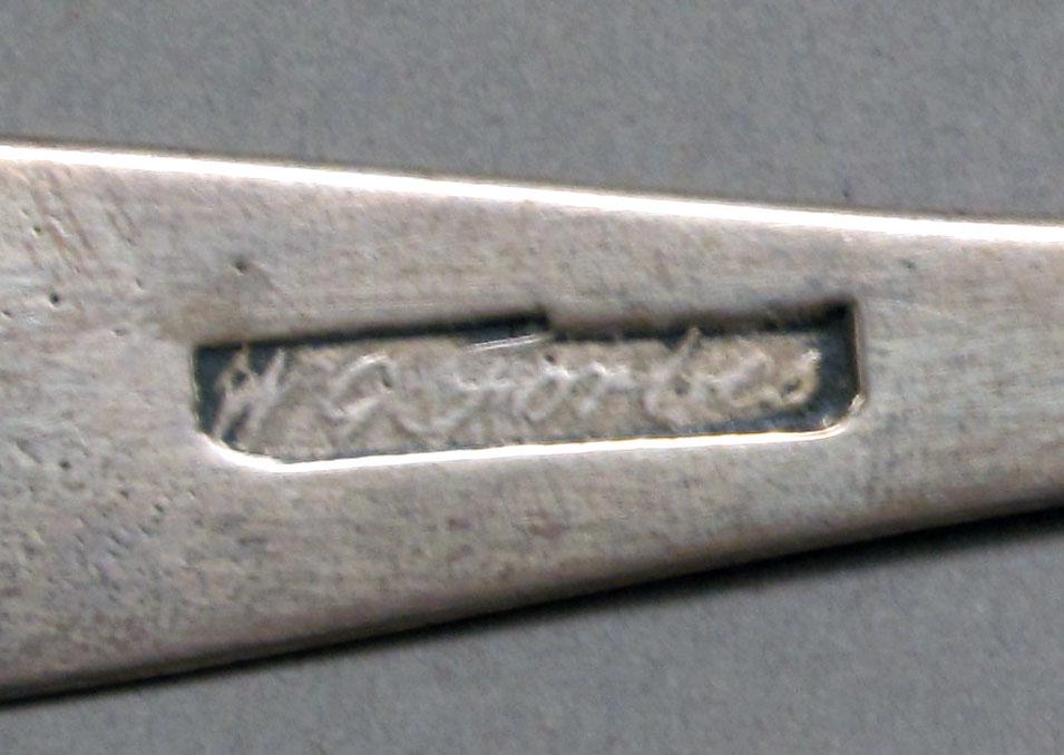 1962.0240.249 Silver spoon mark
