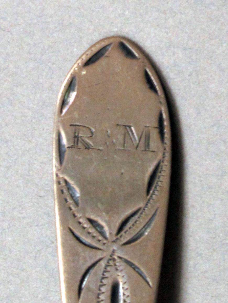 1962.0240.251 Silver spoon engraving