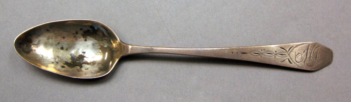 1962.0240.252 Silver spoon upper surface