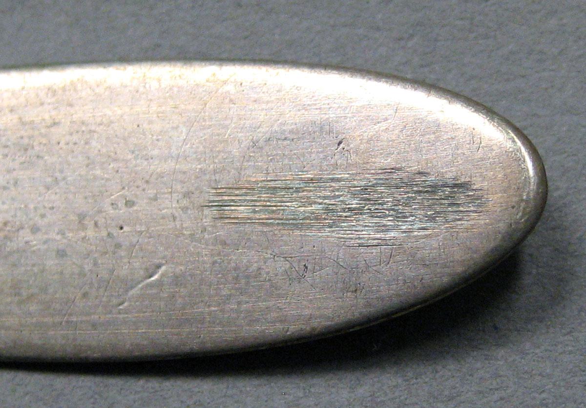 1962.0240.336 Silver Spoon possible effaced mark