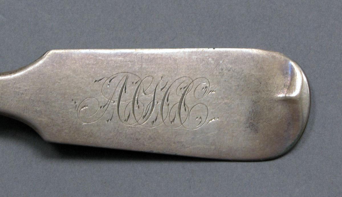 1962.0240.339 Silver spoon engraving
