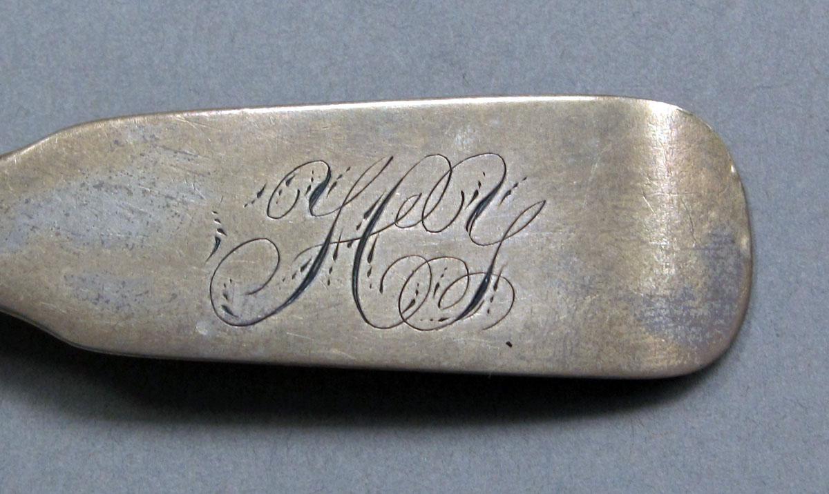 1962.0240.340 Silver spoon engraving