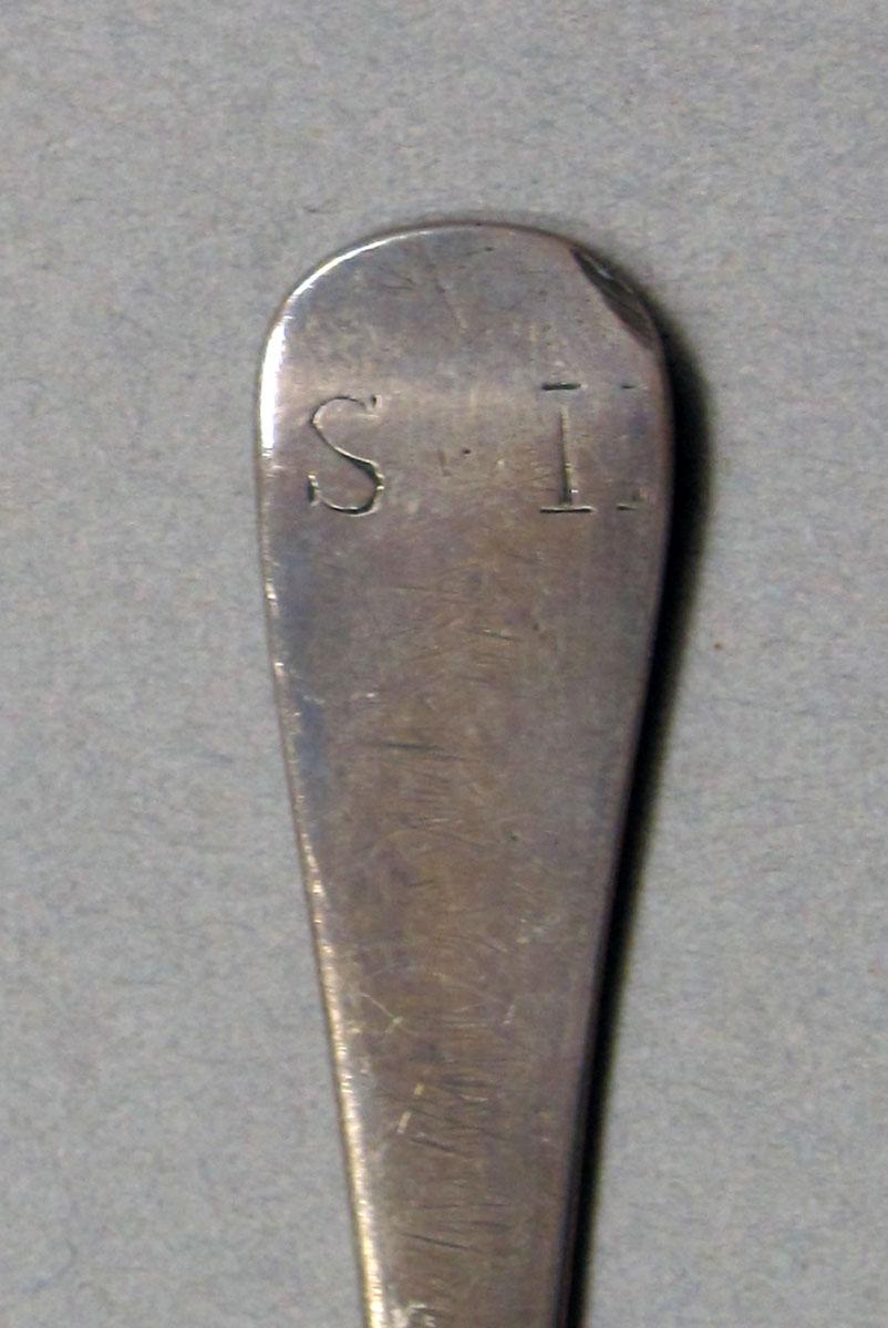 1962.0240.342 Silver spoon engraving