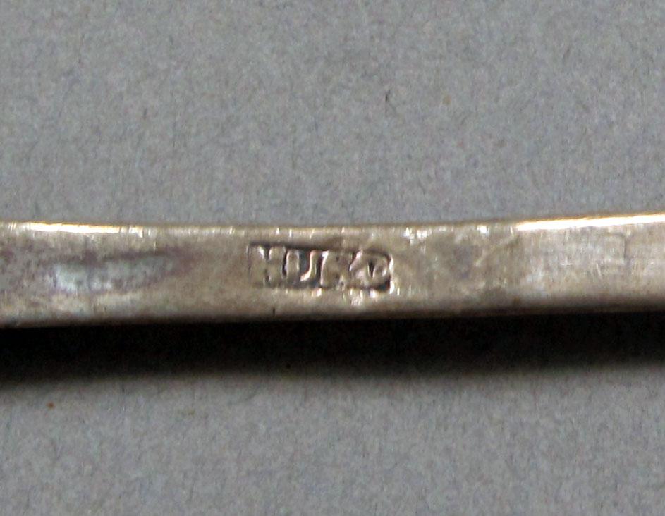 1962.0240.347 Silver spoon mark