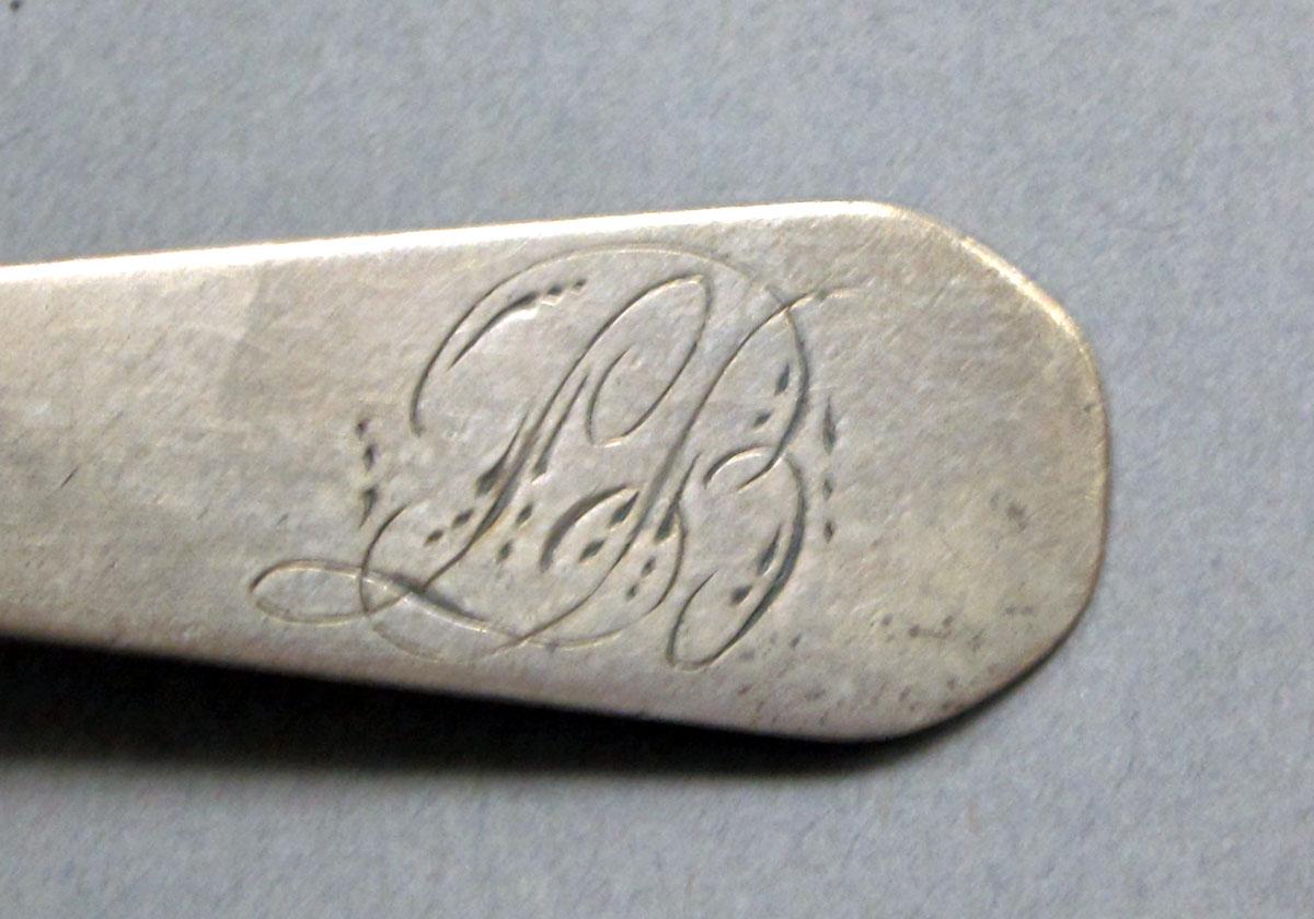1962.0240.348 Silver spoon engraving