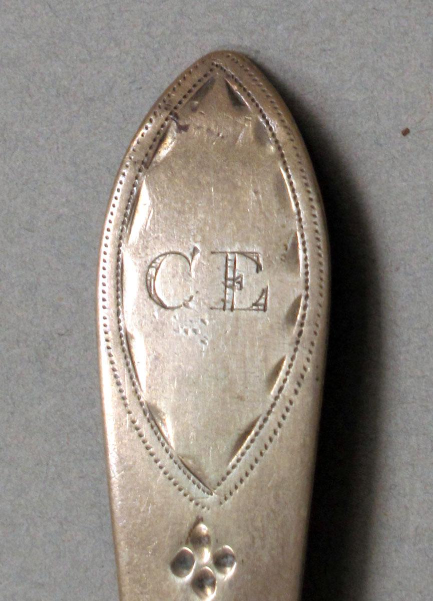 1962.0240.349 Silver spoon engraving
