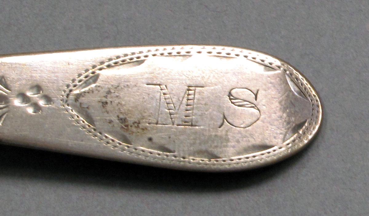 1962.0240.352 Silver spoon engraving