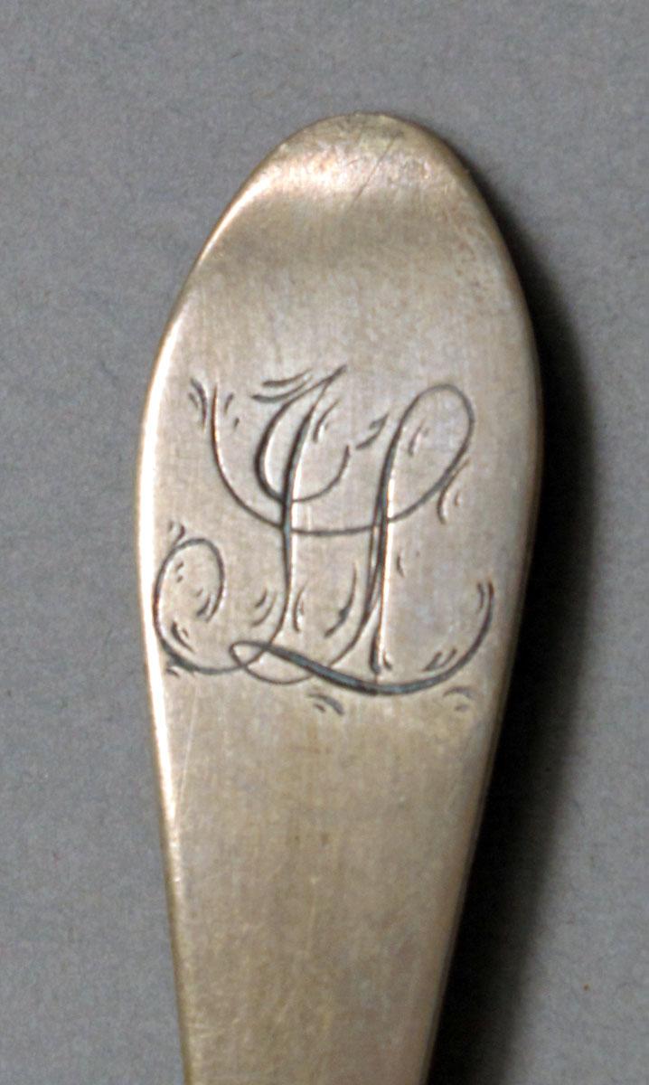 1962.0240.354 Silver spoon engraving