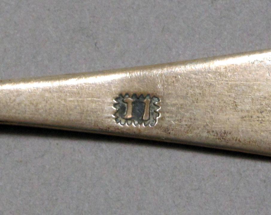 1962.0240.354 Silver spoon mark