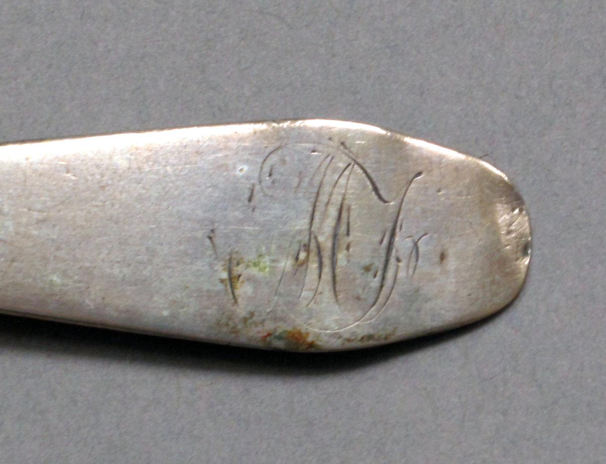1962.0240.357 Silver spoon engraving