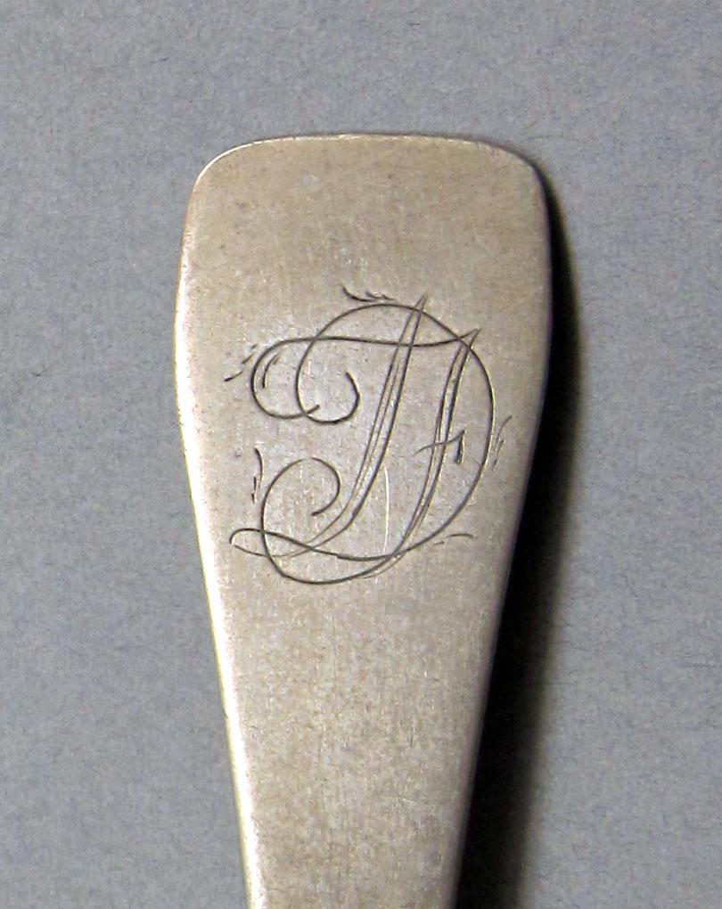 1962.0240.359 Silver spoon engraving