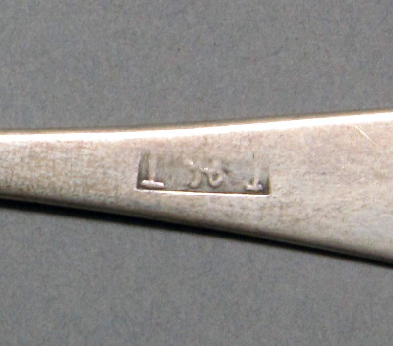 1962.0240.359 Silver spoon mark