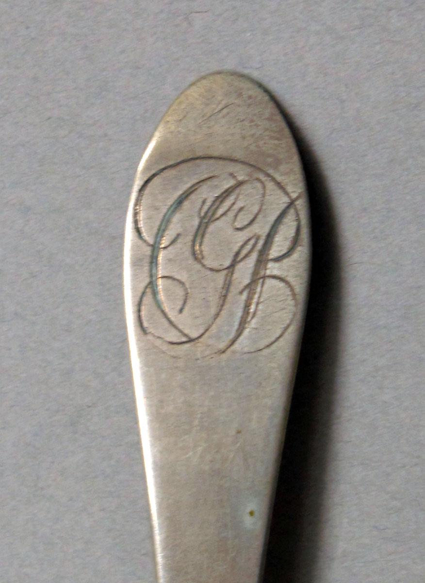 1962.0240.366 Silver spoon engraving