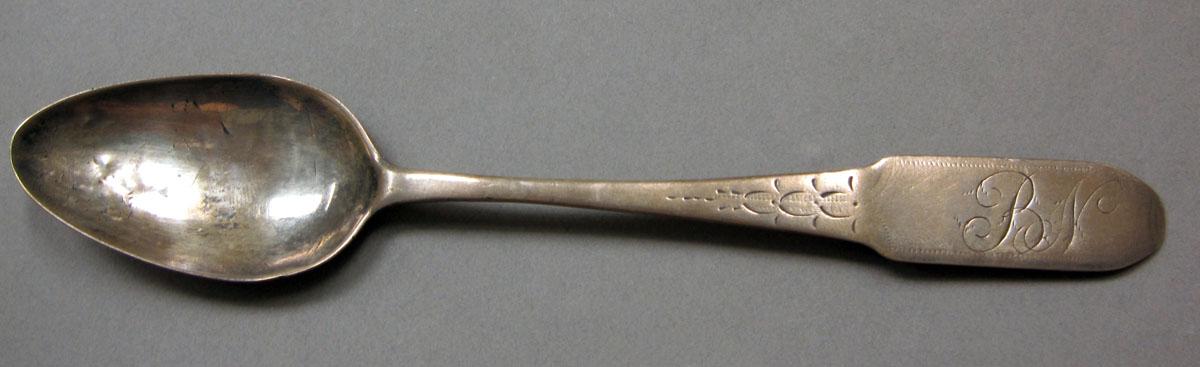 1962.0240.368 Silver spoon upper surface