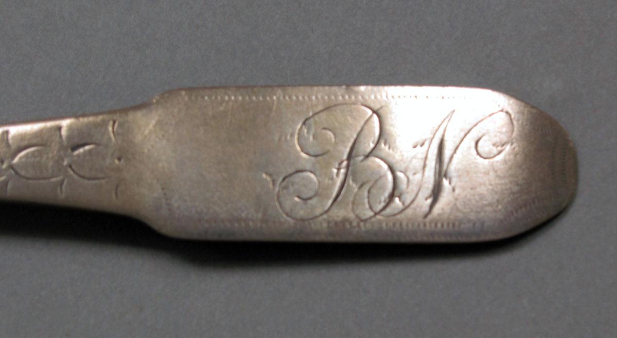 1962.0240.368 Silver spoon engraving