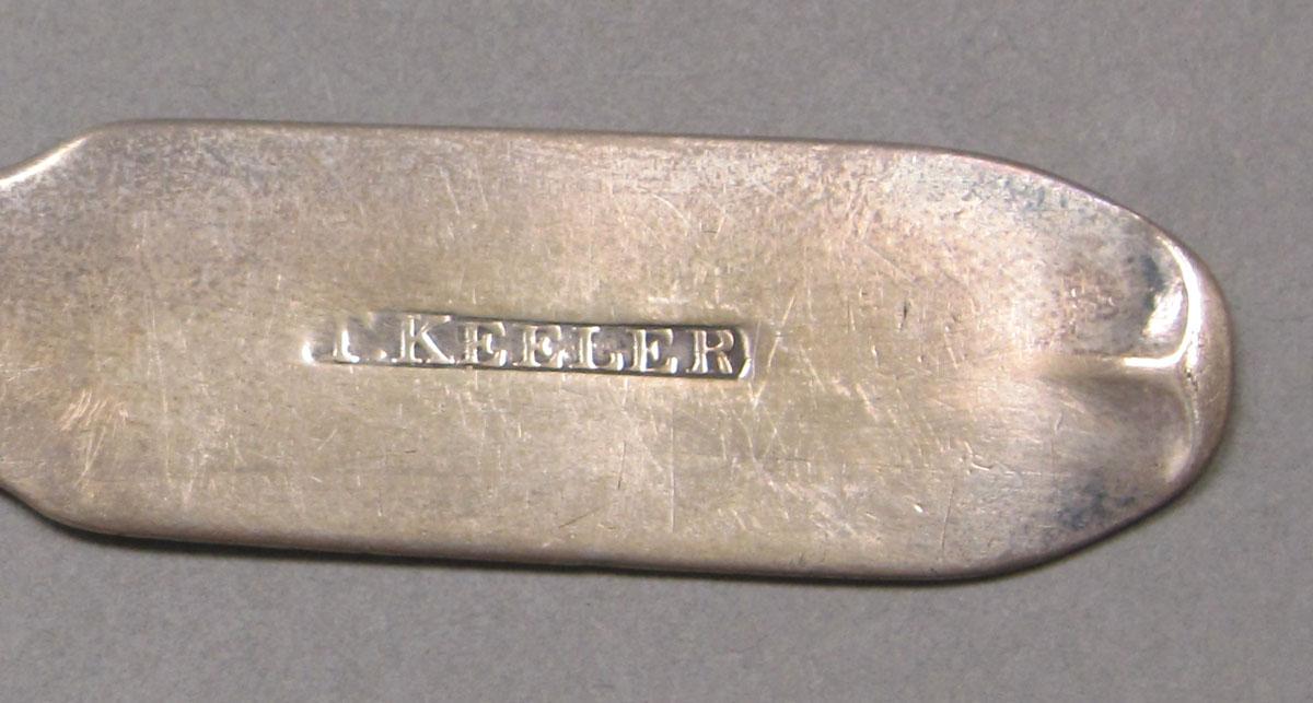 1962.0240.368 Silver spoon mark