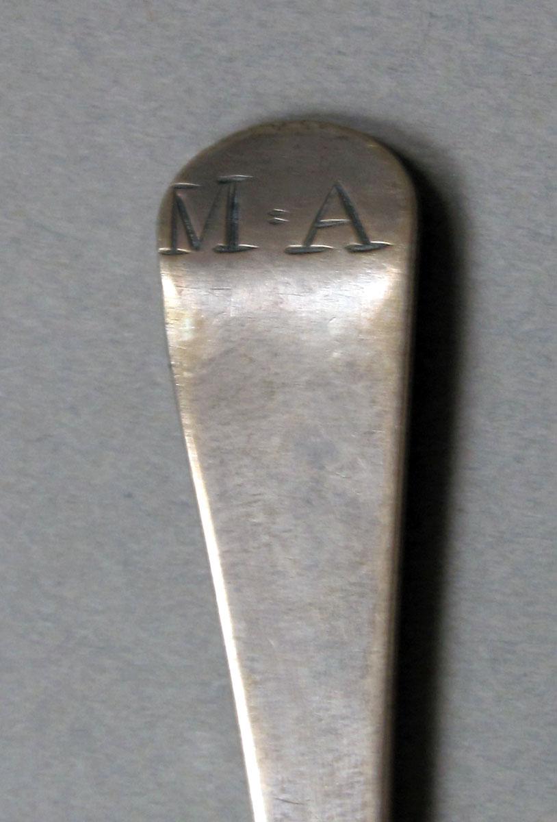 1962.0240.375 Silver spoon engraving