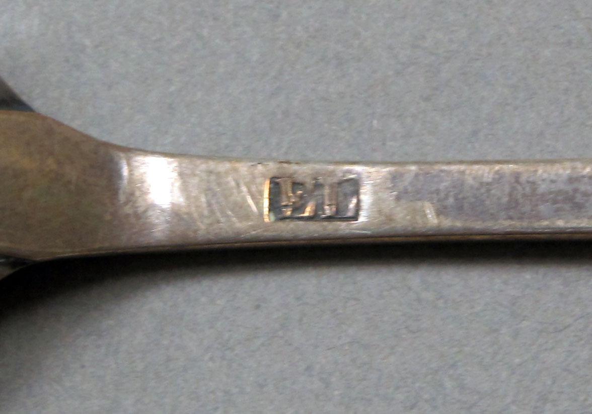 1962.0240.375 Silver spoon mark