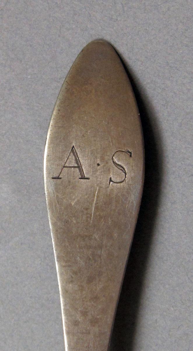1962.0240.376 Silver spoon engraving