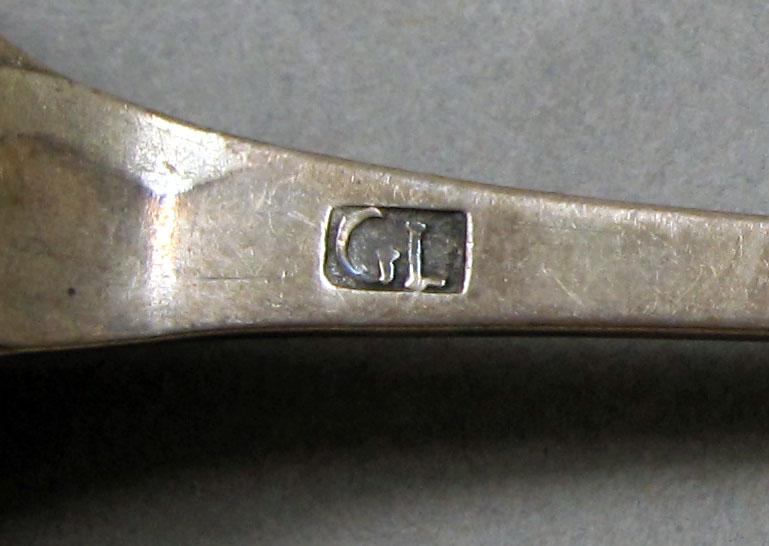 1962.0240.376 Silver spoon mark