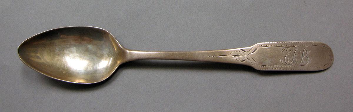 1962.0240.378 Silver spoon upper surface