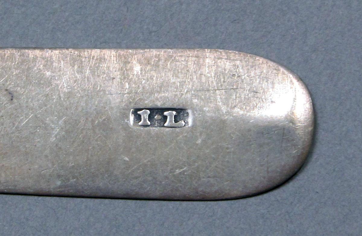 1962.0240.378 Silver spoon mark