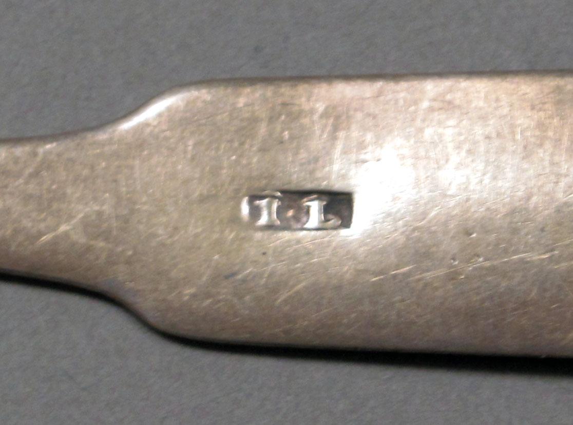 1962.0240.379 Silver spoon mark