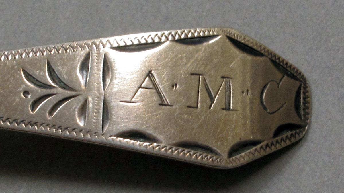 1962.0240.380 Silver spoon engraving