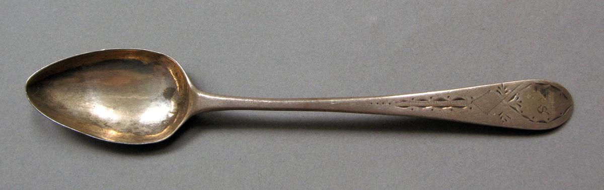 1962.0240.382 Silver spoon upper surface