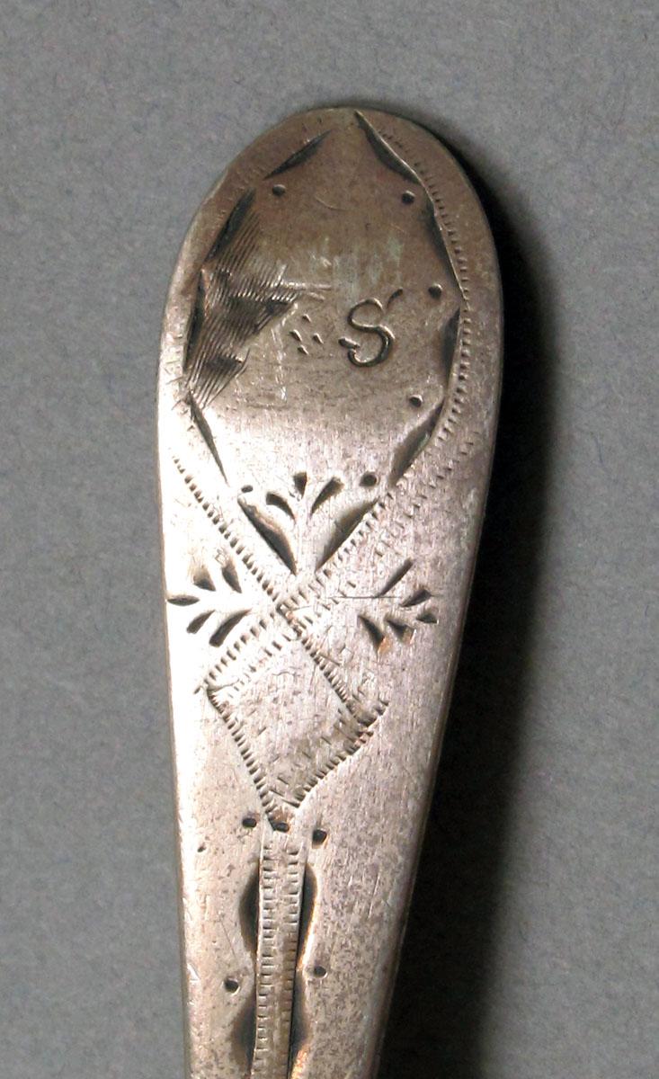 1962.0240.382 Silver spoon engraving