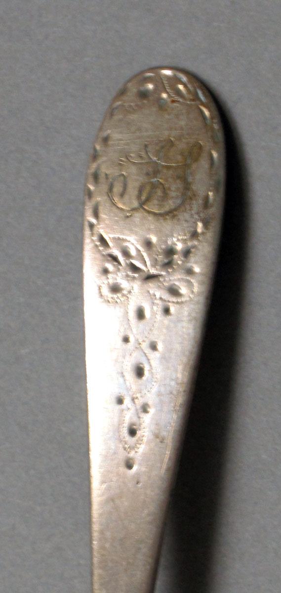 1962.0240.383 Silver spoon engraving
