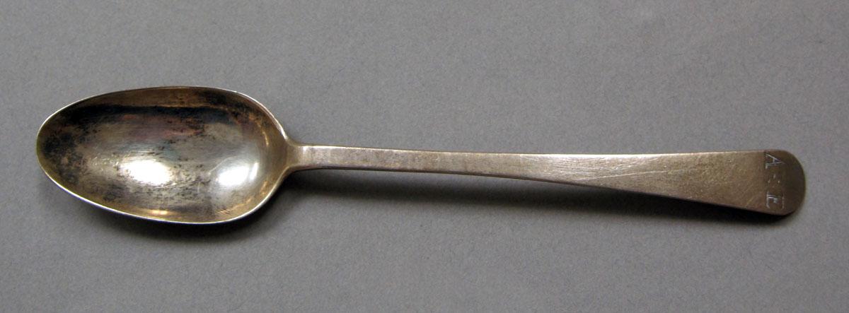 1962.0240.384 Silver spoon upper surface