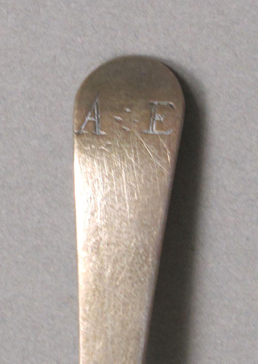 1962.0240.384 Silver spoon engraving