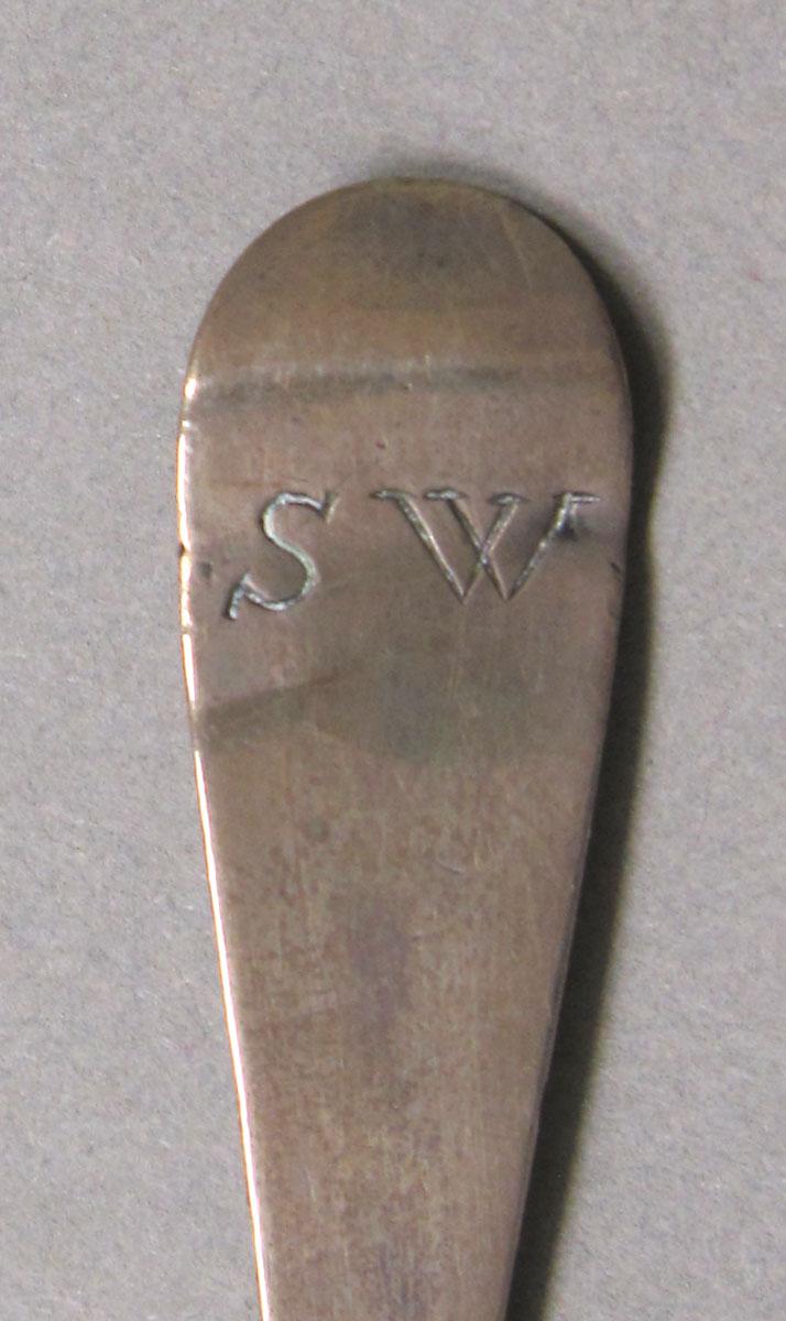 1962.0240.385 Silver spoon engraving