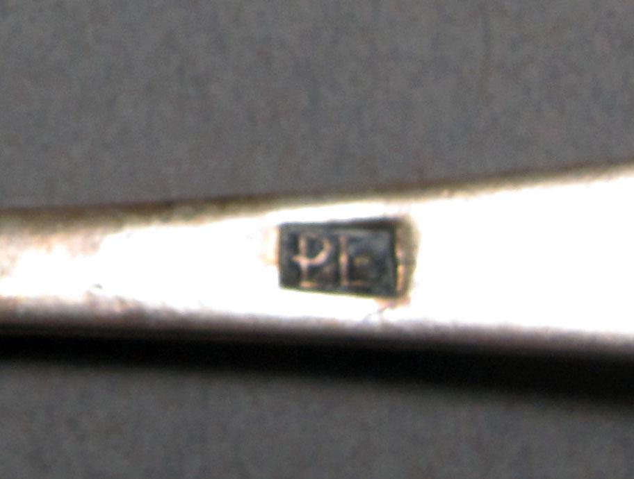 1962.0240.385 Silver spoon mark