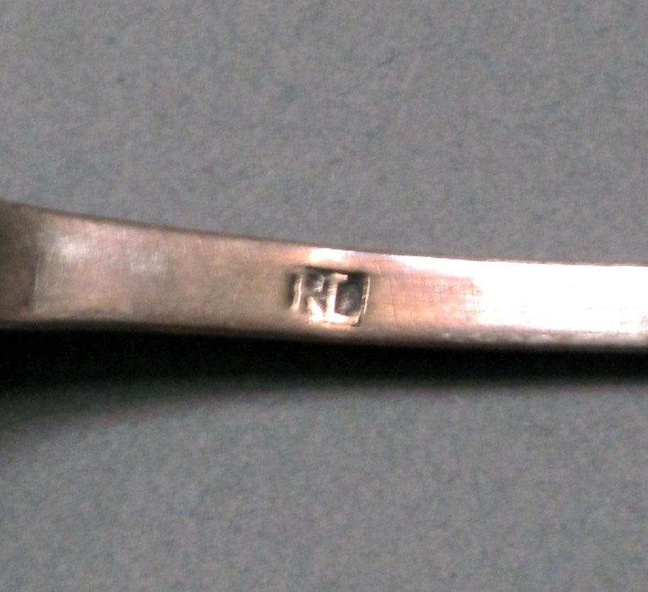 1962.0240.386 Silver spoon mark