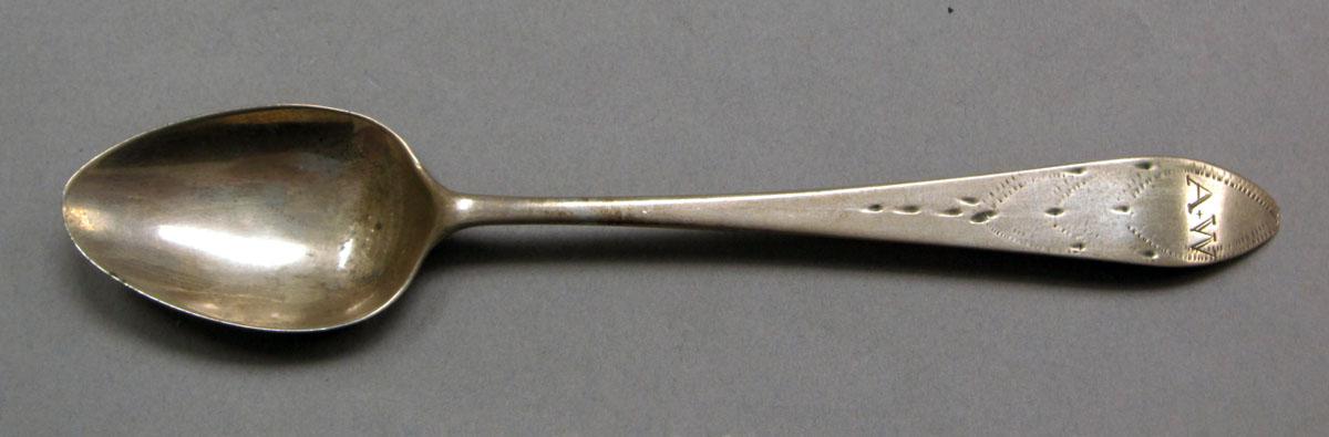 1962.0240.387 Silver spoon upper surface