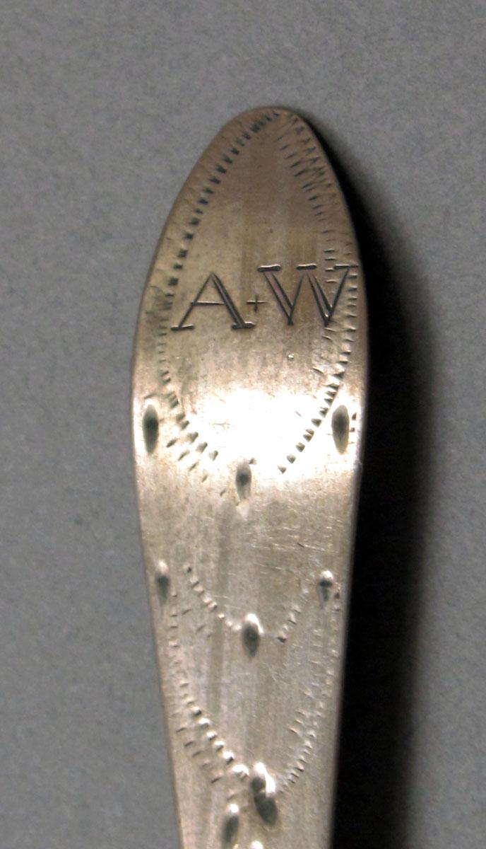 1962.0240.387 Silver spoon engraving