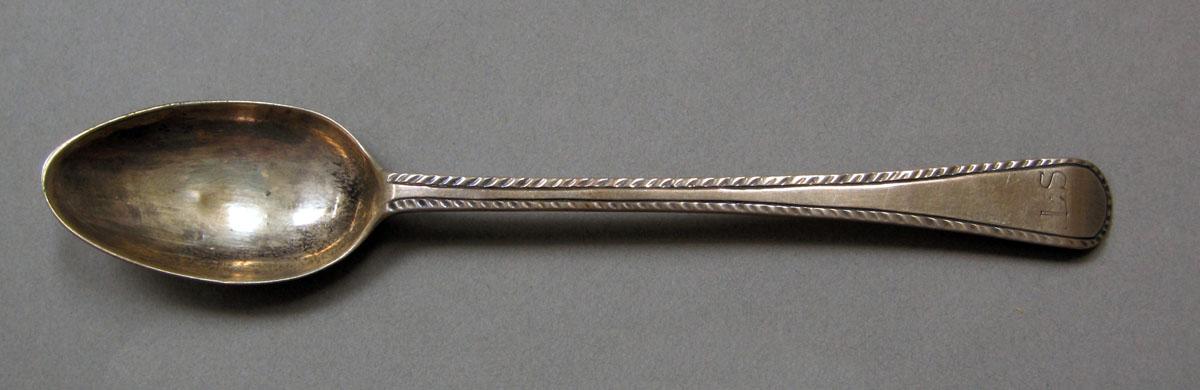 1962.0240.388 Silver spoon upper surface