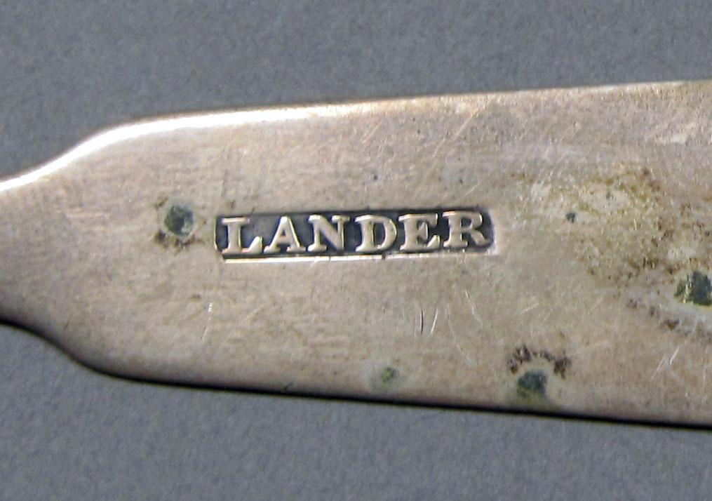 1962.0240.389 Silver spoon mark