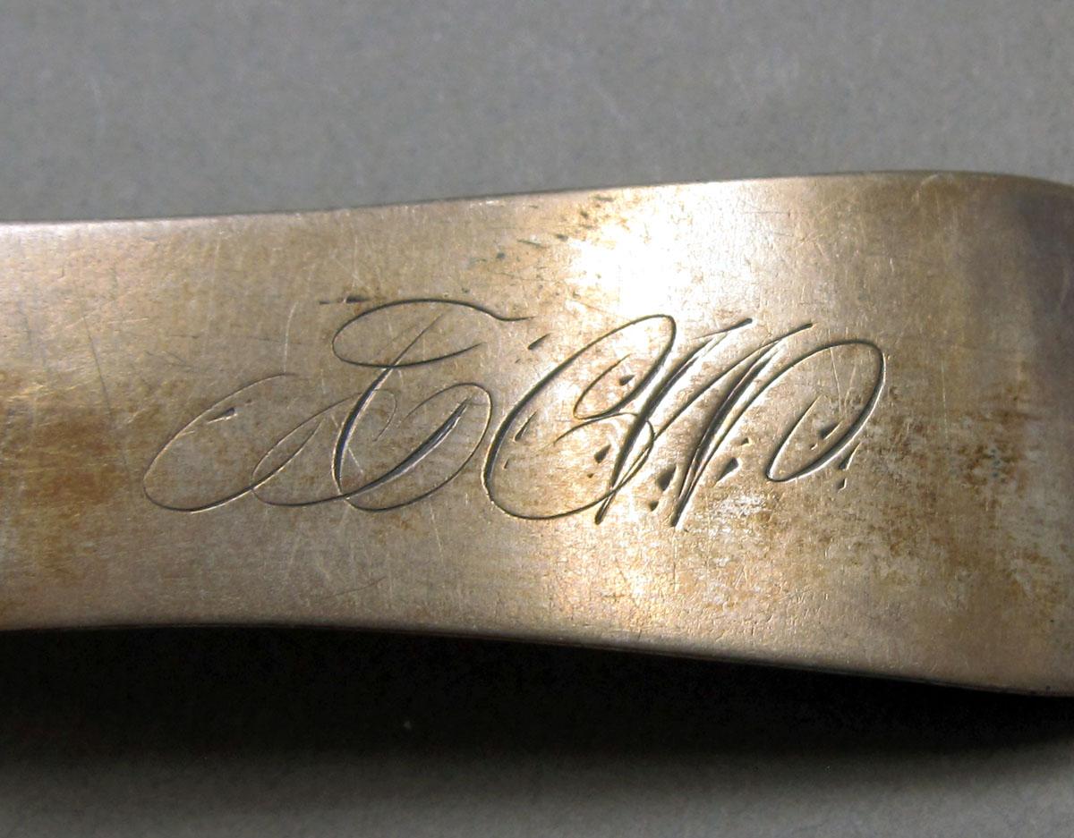 1962.0240.393 Silver spoon engraving
